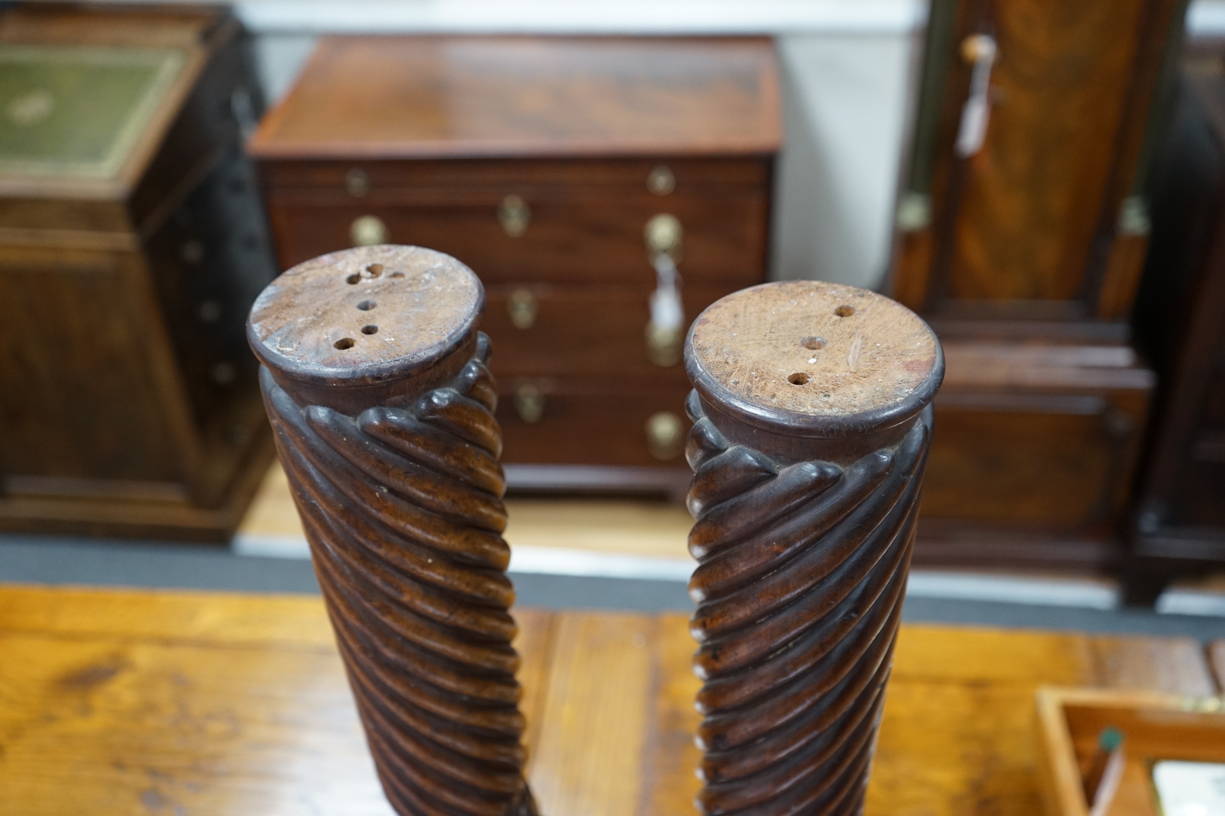 A pair of William mahogany 'bedpost' candlestands